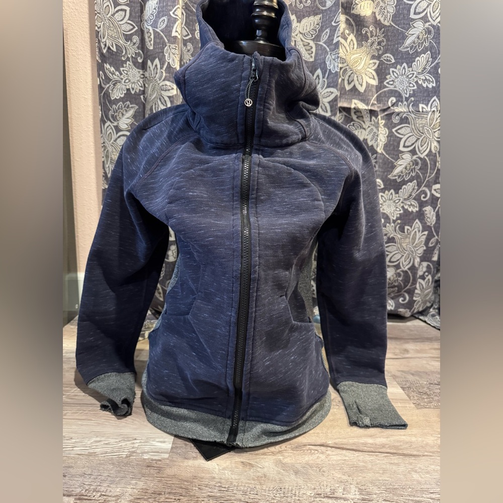 Lululemon hoodie- has good life left in it, cuffs frayed small hole by pocket